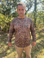 Hunter Camo long sleeve shirt by DO IT YOURSELF HUNTER made of spandex and polyester, designed for flexible outdoor wear.