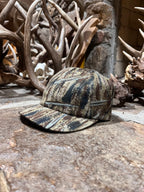 DO IT YOUR HUNTER camo cap for archery, featuring a camouflage design, adjustable strap, and outdoor hunting style.