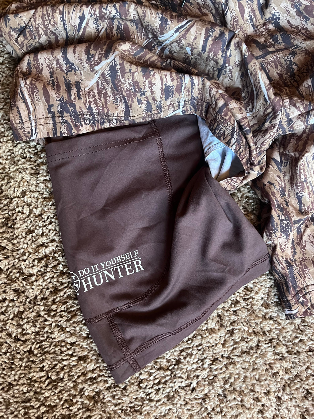 Pair of camouflage shorts from DO IT YOURSELF HUNTER, featuring a casual design and comfortable fit, shown in the image.